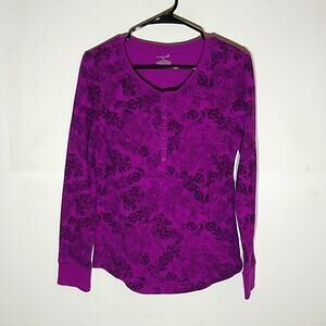 Exertek purple thermal top with printed design.
